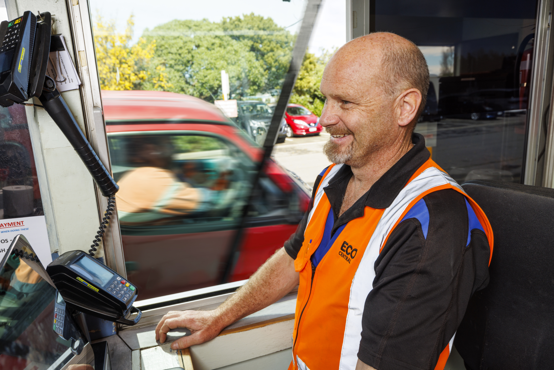 Image of EcoDrop customer service person at drive through